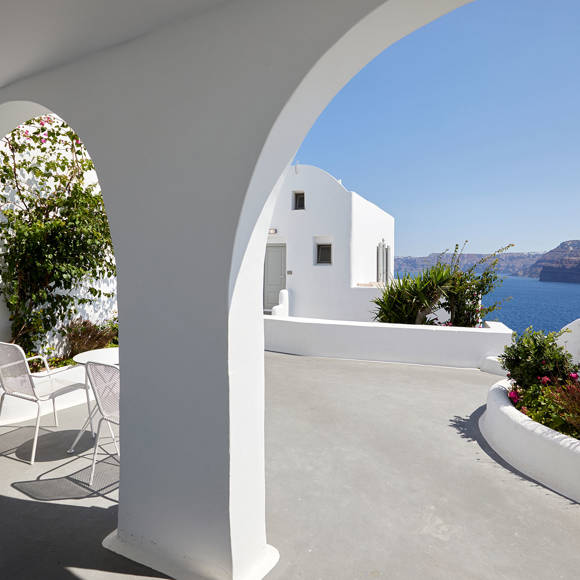 Santorini View Hotel patio with sea view and gardens