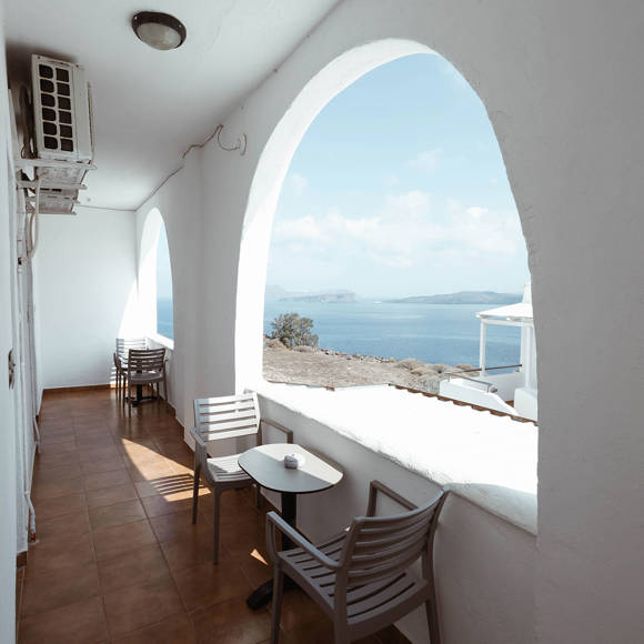 Santorini View Hotel sea view balcony with table and chairs